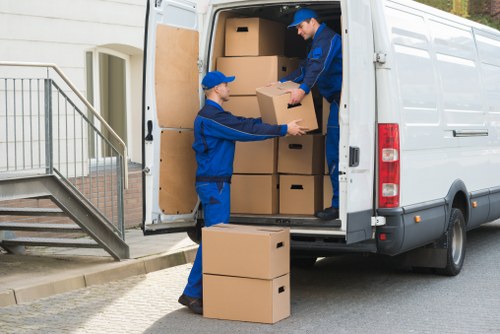 Moving van parked on a Merton street near residential homes