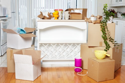 Packed boxes and household items ready for transport in Merton