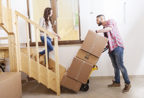 Moving van service operating in a residential street in Merton