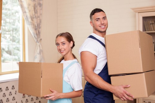 Packed business items ready for transport during a commercial relocation